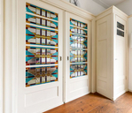 Schuifdeuren met glas in lood
<br/>
Funda, 2015